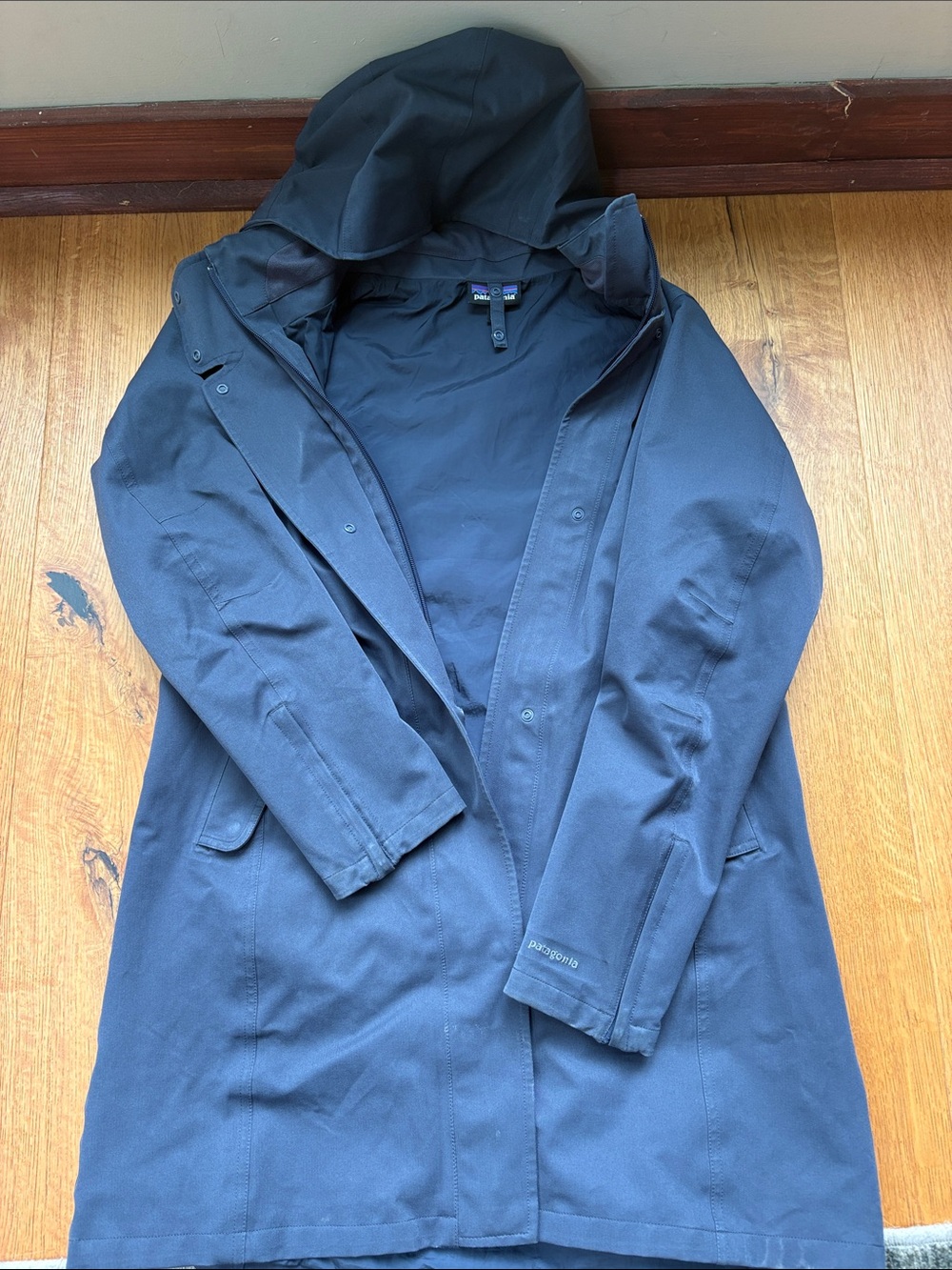 Patagonia Navy Hooded Raincoat with Minimalist Design